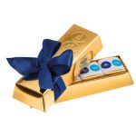 Goldbarren Box mit 4 Schokoladenwürfeln und individueller Prägung als Werbeartikel.