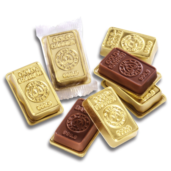 Der Mini Goldbarren ist aus 18g Vollmilchschokolade mit Standardprägung. Aber auch eine Sonderprägung ist möglich. Jeder Mini Goldbarren ist verpackt im goldenen Blister mit transparenter Folie.