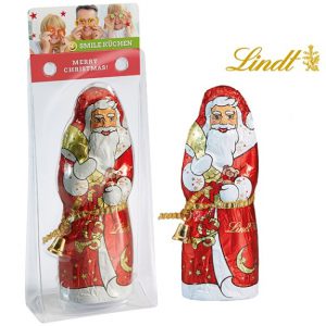 Der Weihnachtsmann Lindt ist 70g und verpackt in einem transparenten Blister mit einem Werbekärtchen. Das Kärtchen wird individuell bedruckt.