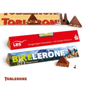 Toblerone 100 g im Werbeschuber individuell bedrucken als Werbeartikel.