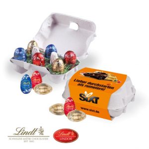 Lindt Ostereier in einem Eierkarton mit Logo individuell bedruckt als Werbegeschenk.
