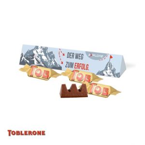 Toblerone mini zu 3 Stück in einer Werbebox und mit Logo individuell bedrucken als Werbeartikel.