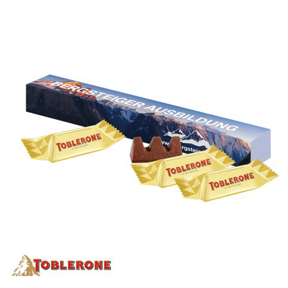 Toblerone mini zu 3 Stück in einer Kartonverpackung mit individuellem Druck als Werbeartikel.