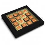 Pralinen bedruckt mit Logo direkt auf der Schokolade, verpackt zu 16 Pralinen in einer Geschenkbox mit Sichtfenster.