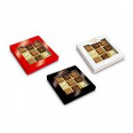 Pralinen mit Logo bedruckt direkt auf der Schokolade verpackt zu 9 Stück in einer Geschenkverpackung mit Sichtfenster.