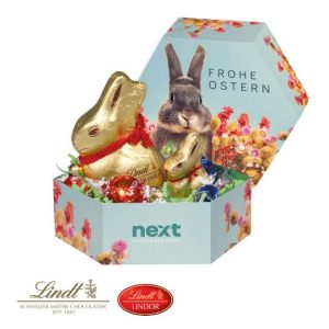 Großes Osternest von Lindt mit Ostereier und Lindt Goldhase und mit Logo individuell bedruckt als Werbeartikel.