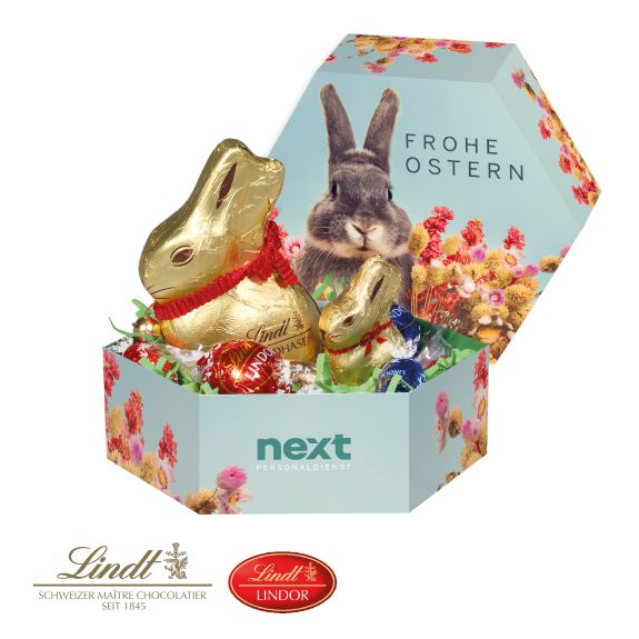 Großes Osternest von Lindt mit Ostereier und Lindt Goldhase und mit Logo individuell bedruckt als Werbeartikel.
