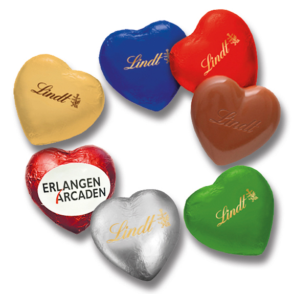 Lindt Herz aus Schokolade mit Werbe Etikett mit Logo bedruckt als Werbeartikel.
