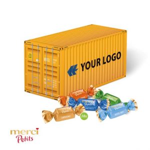 3D Präsent Container gefüllt mit Merci Petits und individuell mit Logo bedruckt als Werbeartikel.