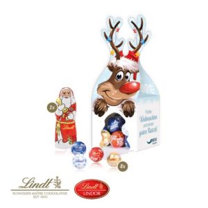 3D Weihnachtspräsent in Rentier-Form gefüllt mit Lindt Schokoladenmischung und mit Logo individuell bedruckt als Werbeartikel.