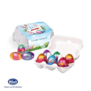 Ostereier von Klett im Eierkarton mit Werbebanderole, individuell mit Logo bedruckt als Werbeartikel.