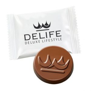 Schokoladentaler mit Sonderprägung in individuell bedruckter Folie.