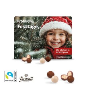 Adventskalender mit Fairtrade Brandt Knusperkugeln und mit Logo individuell bedruckt als Werbeartikel.